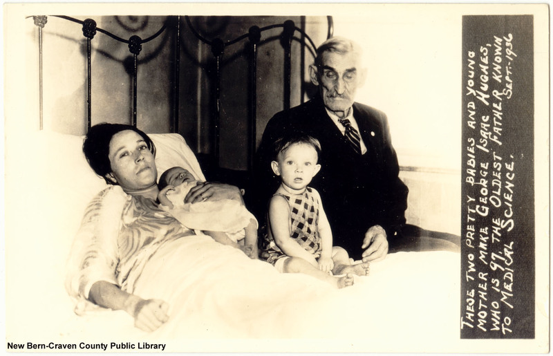 George Isaac Hughes, with his wife and children