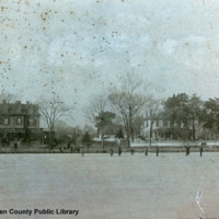 East Front Street and Neuse River, river frozen and several standing on the ice, 1895