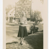 Mary Duffy Hughes standing in front of Tryon Palace Historical Marker