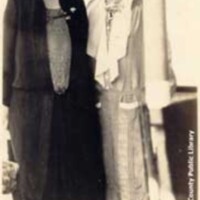 Mrs. John Whitford and Mrs. Sam Dill on deck of the United States Coast Guard Cutter Pamlico.