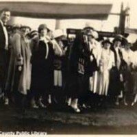 Group of people gathered on the deck of the Unites States Coast Guard Cutter Pamlico