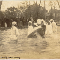 Negro baptism, 400 block, East Front Street, postcard, ca. 1910