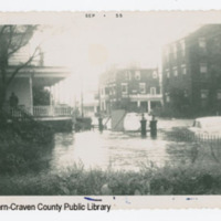 Pollock Street, looking east, during hurricane, September 1955